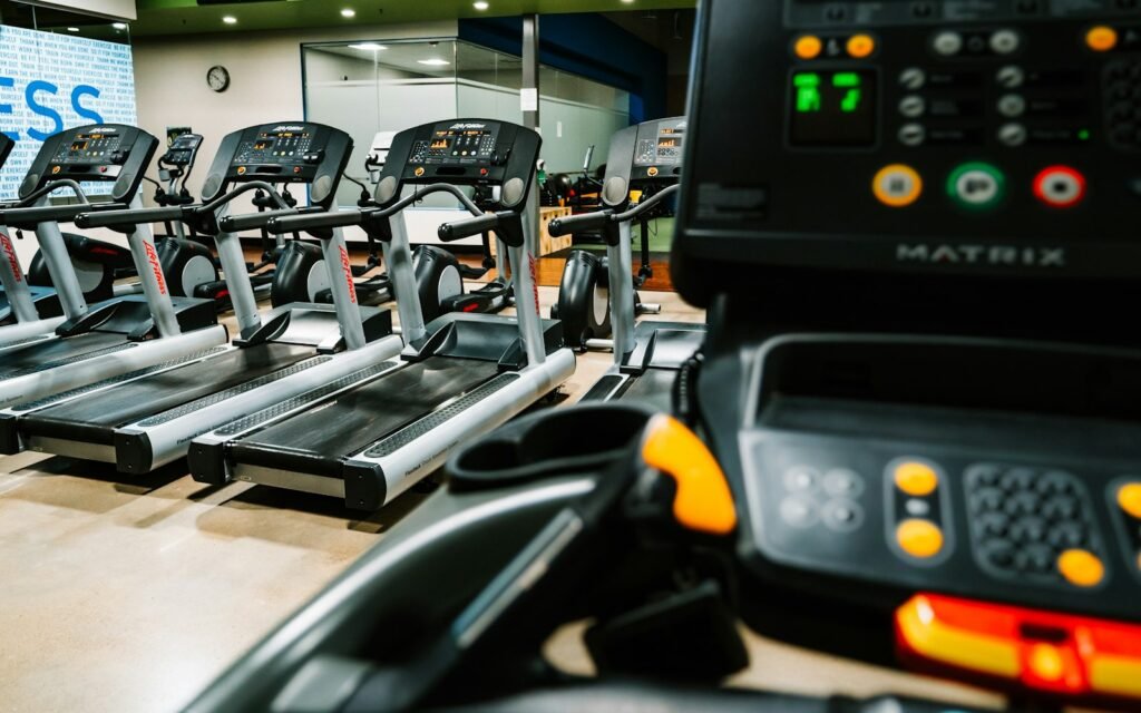 Treadmills: Everything You Need to Know Before Buying One Treadmills lined up in a gym